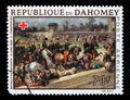 Stamp printed in Dahomey shows Battle of Magenta, by Louis Eugene Charpentier, Red Cross series Royalty Free Stock Photo