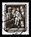 Stamp printed in DDR shows the painting Holy Family, by Andrea Mantegna Royalty Free Stock Photo