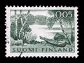 Stamp printed by Finland, shows Landscape with Lake and Rowing Boat Royalty Free Stock Photo