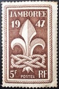 Stamp printed in France, shows Scout Jamboree Emblem