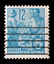 Stamp printed in GDR, shows Farmer, worker, intellectuals Royalty Free Stock Photo