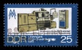 Stamp printed in GDR shows Lathe Machine, Leipzig Spring Fair