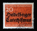 Stamp printed in Germany dedicated to 400 years of the Heidelberg Catechism, containing the doctrine of the reformed church