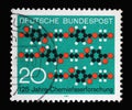 Stamp printed in Germany showing a picture with chain molecules, 125 years of chemical fiber research