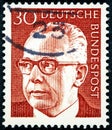 Stamp printed in Germany showing a portrait of Federal President Gustav Walter Heinemann