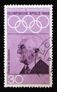 Stamp printed in Germany showing portrait of Pierre de Coubertin