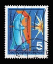 Stamp printed in Germany showing a welder with a protective suit, volunteer service technical aid agency