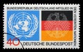 Stamp printed in the Germany shows Emblems from UN and German Flags, Germany`s admission to the UN