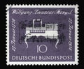 Stamp printed in Germany, shows note handwriting of Mozart and clavichord