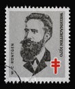 Stamp printed in Germany shows portrait of Wilhelm Conrad RÃÂ¶ntgen, Christmas 1970 Royalty Free Stock Photo