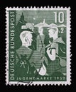 Stamp printed in Germany, shows Wandering girls, Youth Hostel