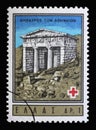 Stamp printed by Greece shows Athenian Treasury  Delphi  International Red Cross series Royalty Free Stock Photo