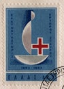 Stamp printed by Greece shows Red Cross - Centenary Emblem  International Red Cross series Royalty Free Stock Photo