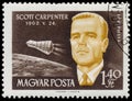 Stamp printed in Hungary shows astronaut Scott Carpenter