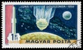 Stamp printed in Hungary shows rockets picture, Moon and satellite Luna 1