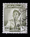 Stamp printed in Iraq shows portrait of King Faisal II 1935-1958, series Royalty Free Stock Photo