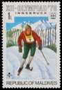 Stamp printed by Maldives, shows Alpine skiing at the Winter Olympics in Innsbruck