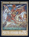 Stamp printed in the Romania, shows a fresco of St. George, Moldovita Monastery