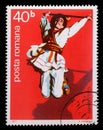 Stamp printed by Romania, shows Romanian male folk dancer