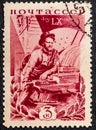 RUSSIA - CIRCA 1935: stamp printed by Russia, shows Kalinin at the lathe, circa 1935