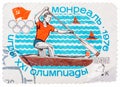 Stamp printed in Russia Soviet Union , Summer Olympics in Montreal, canoeing, athlete is swimming in a boat with a