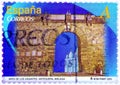 Stamp printed in Spain from the Cultural Monumental arches and doors issue shows arch of the giants in Antequera Malaga
