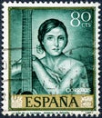 Stamp printed by Spain shows The girl with the guitar painted by Romero de Torres