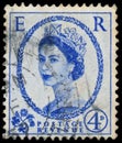 Stamp printed in UK shows portrait of Queen Elizabeth II Royalty Free Stock Photo