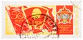 Stamp printed in USSR, shows banner of komsomol with badge and Order of October Revolution, devoted to the 50-th Royalty Free Stock Photo