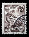 Stamp printed in Yugoslavia shows woodworker