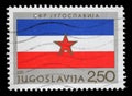 Stamp printed by Yugoslavia shows Yugoslav flag