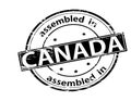 Stamp with text Assembled in Canada Royalty Free Stock Photo