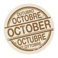 Stamp with the word October in different languages