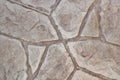 Stamped concrete mosaic patterns, earth tone colors and textures from directly above. Royalty Free Stock Photo