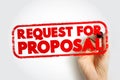 Stamped text REQUEST FOR PROPOSAL with hand holding marker. Business concept about contract, tender, and formal document request Royalty Free Stock Photo