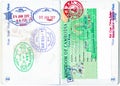 Stamps of Bahrain, UAE, Cambodia and a Cambodian visa in a French passport