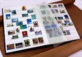 Many stamps in an album. Royalty Free Stock Photo