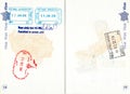 Stamps of Vietnam, Qatar and Montenegro in a French passport Royalty Free Stock Photo