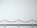 Stanchion with red barrier rope Royalty Free Stock Photo