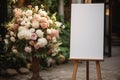 Stand adorned with blank white board, awaiting wedding memories to be showcased Royalty Free Stock Photo