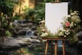 Stand adorned with blank white board, awaiting wedding memories to be showcased Royalty Free Stock Photo