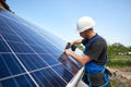 Stand-alone exterior solar panel system installation, renewable green energy generation concept. Royalty Free Stock Photo