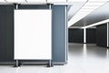 Stand alone white digital advertising screen in a contemporary shopping corridor. Royalty Free Stock Photo