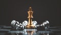 stand of golden king chess and fallen silver chess.chess board game concept of business ideas and competition and stratagy plan Royalty Free Stock Photo