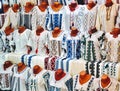 Stand with hand-made, embroidered rural blouses