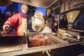 Stand with hot chestnut - winter specialty during christmas in Prague Royalty Free Stock Photo