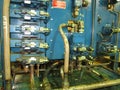 Stand of industrial hydraulic valves.