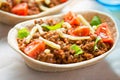 Stand n stuff tortillas with minced beed, tomatoes, lettuce and cheddar Royalty Free Stock Photo