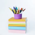 Stand with pencils on a stack of books .photo with copy space Royalty Free Stock Photo