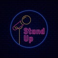 Stand up comedy title board sign logo badge with microphone icon. Retro glowing neon light effect for night entertainment vector